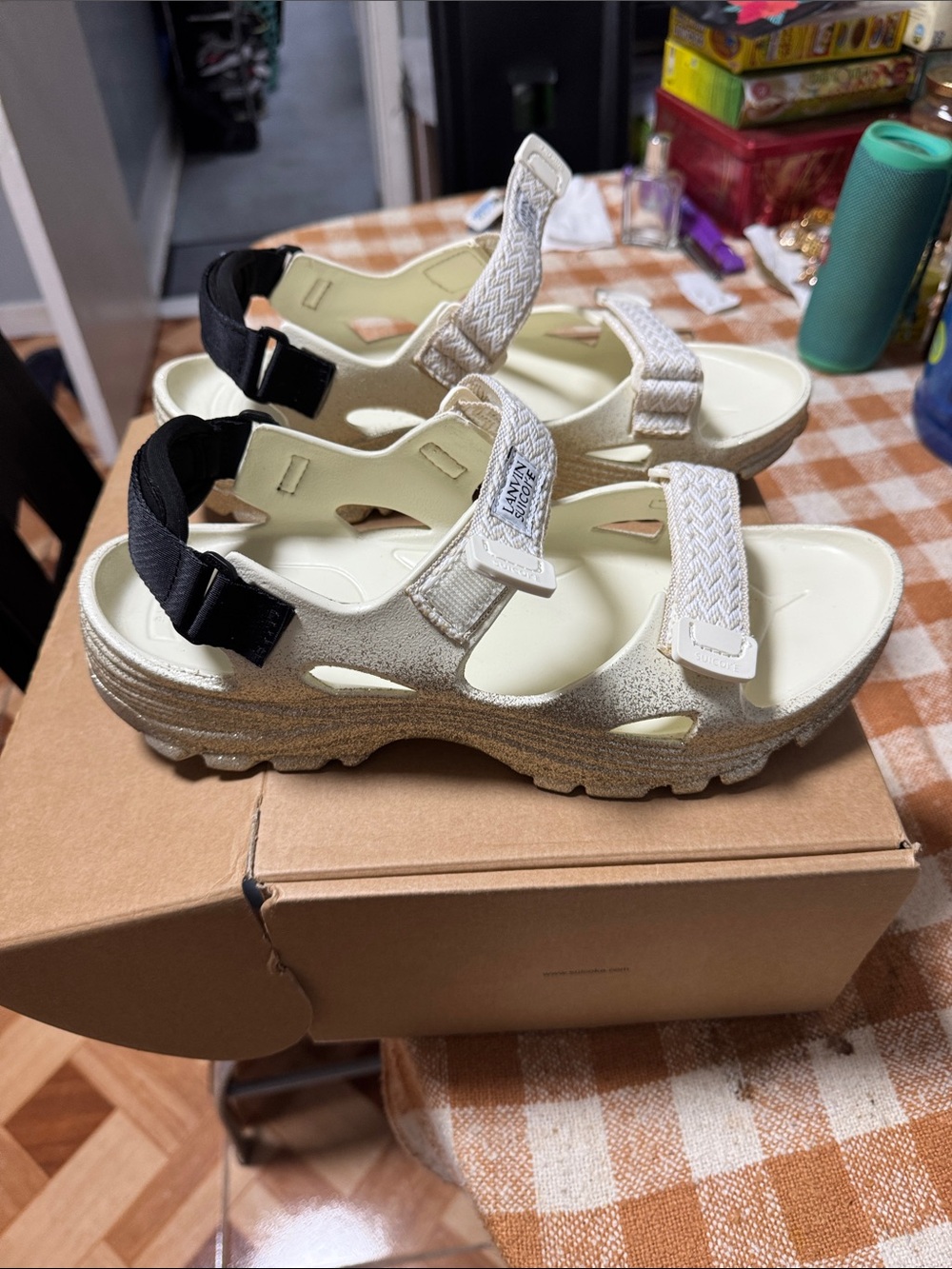 Lightweight Cream and Black Sport Sandals with Adjustable Straps. It runs small